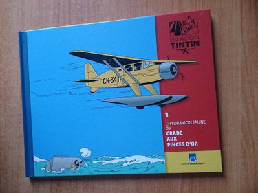 Couverture de EN AVION TINTIN : 1 : L'HYDRAVION JAUNE DU CRANE AUX PINCES D'OR