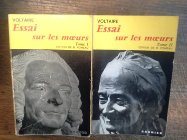 Couverture de Essai sur les moeurs en 2 tomes / Voltaire - éditions Garnier - 903 et 1013 pages - inscriptions sur des pages de garde, des passages sont soulignés,frottements par Voltaire