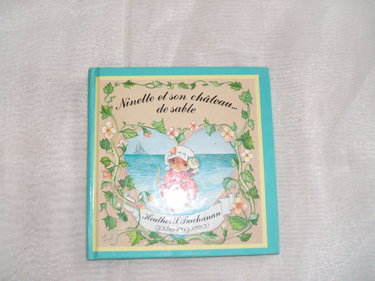 Ninette et son château de sable