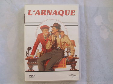 Couverture de L'Arnaque