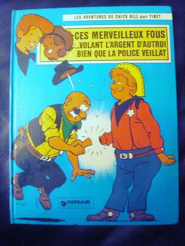 Ces merveilleux fous volant l'argent d'autrui bien que la police veillât (Les Aventures de Chick Bill .)