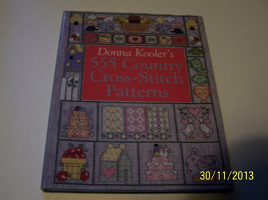 Couverture de Donna Kooler's 555 Country Cross-Stitch Patterns