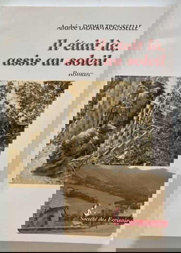 Il était là, assis au soleil