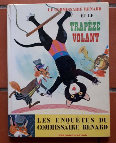 Couverture de LE COMMISSAIRE RENARD ET LE TRAPEZE VOLANT