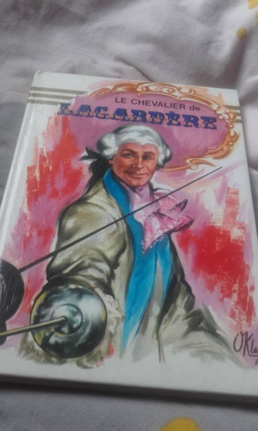 Couverture de Le chevalier de Lagardère : Collection : Notre livre club pour la jeunesse cartonnée & illsutrée par Paul Féval