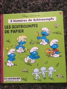 Trois histoires de Schtroumpfs. Vol. 9. Les schtroumpfs de papier. La Noël des Schtroumpfs. Le tournoi