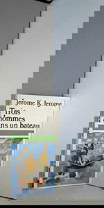 Trois hommes dans un bateau